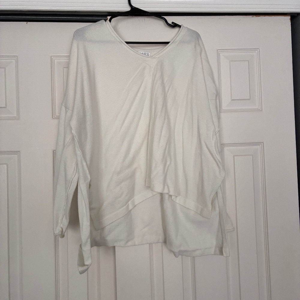 Sheer white V-neck sweater